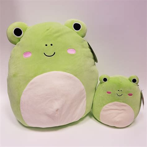 Squishmallow frog toy dressed as a witch